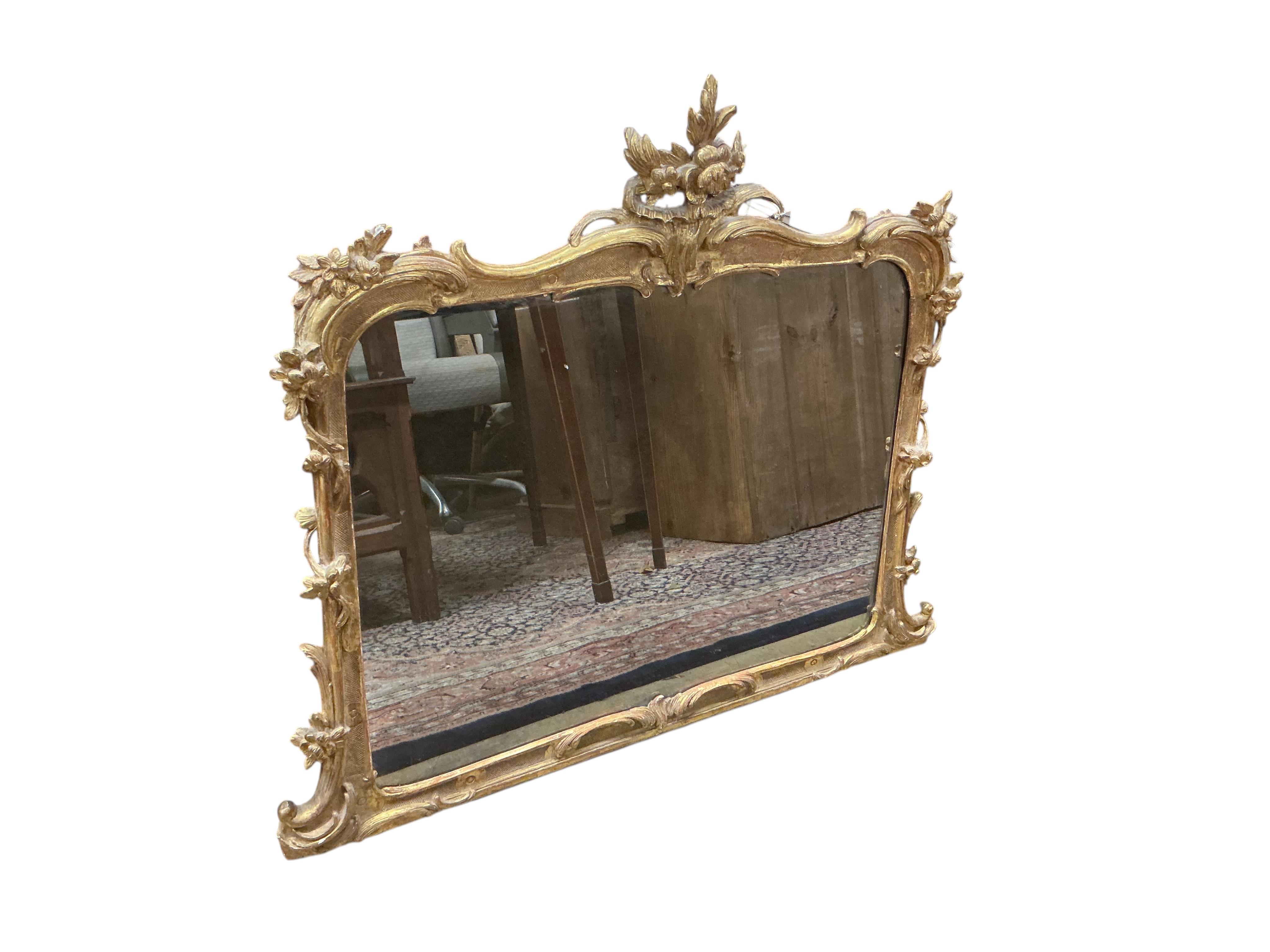 A 19th century carved giltwood and composition wall mirror, width 90cm, height 75cm